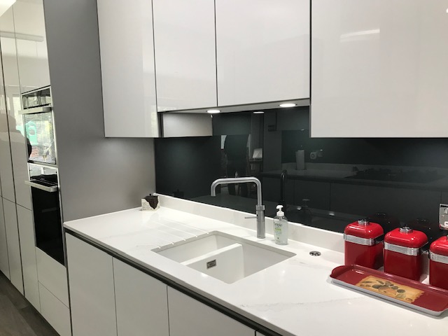 light grey gloss units New kitchen, Essex